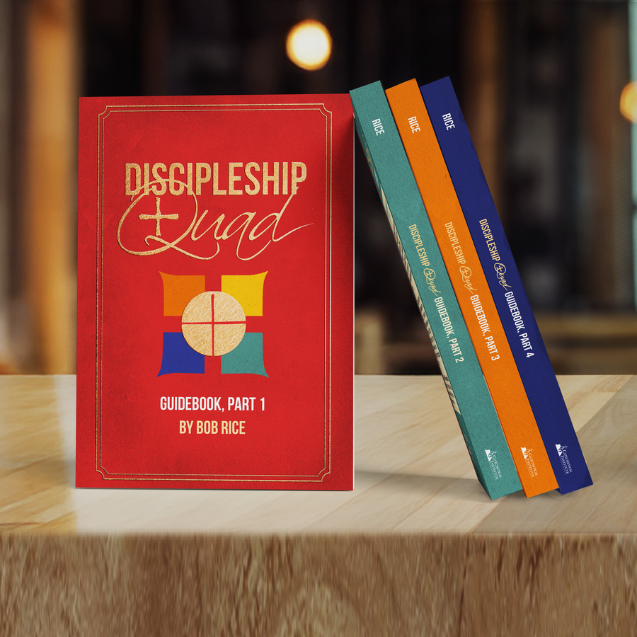 The four Discipleship Quad Guidebooks, Parts 1–4 (English Edition), standing on a wooden shelf